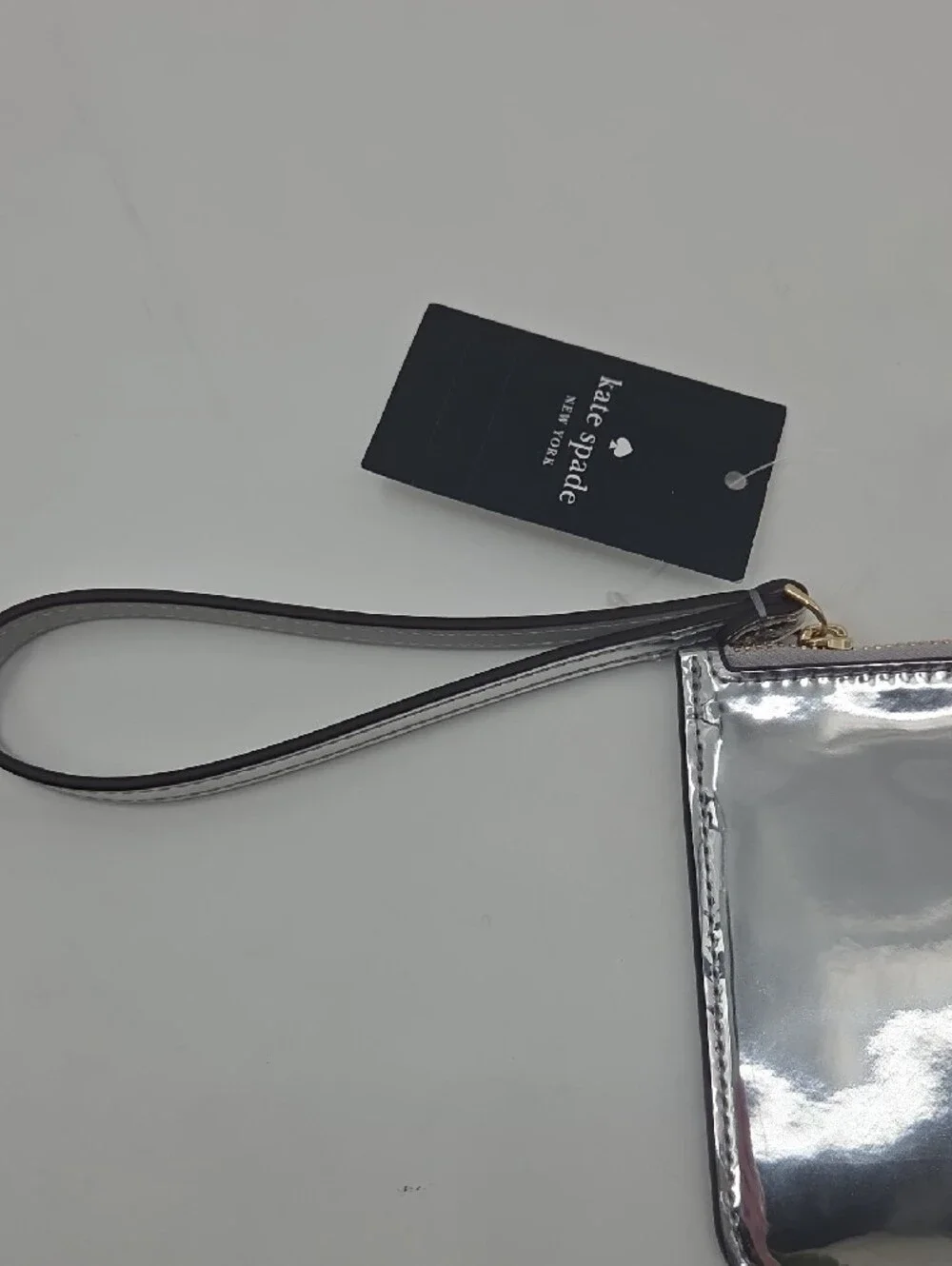 kate spade Metallic Silver Zip Wristlet